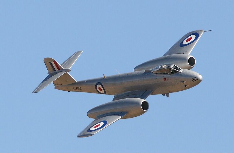 Silver jet in flight