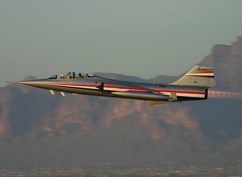 Silver Jet in Flight — Gray, Dramatic, Sunset