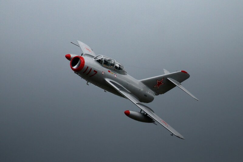 Silver Jet in Flight — Gray, Dramatic