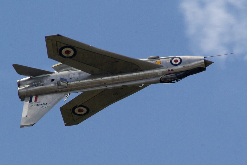 Silver jet in flight