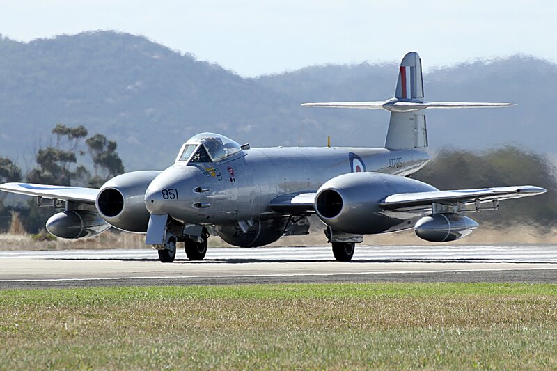 Silver Jet on Runway — Gray, Calm, Afternoon, Photograph