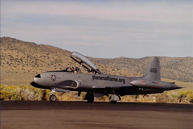 Silver Jet on Runway — Gray, Calm