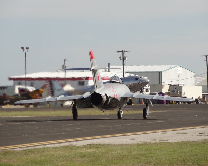 Silver Jet on Runway — Gray, Neutral, Afternoon, Photograph