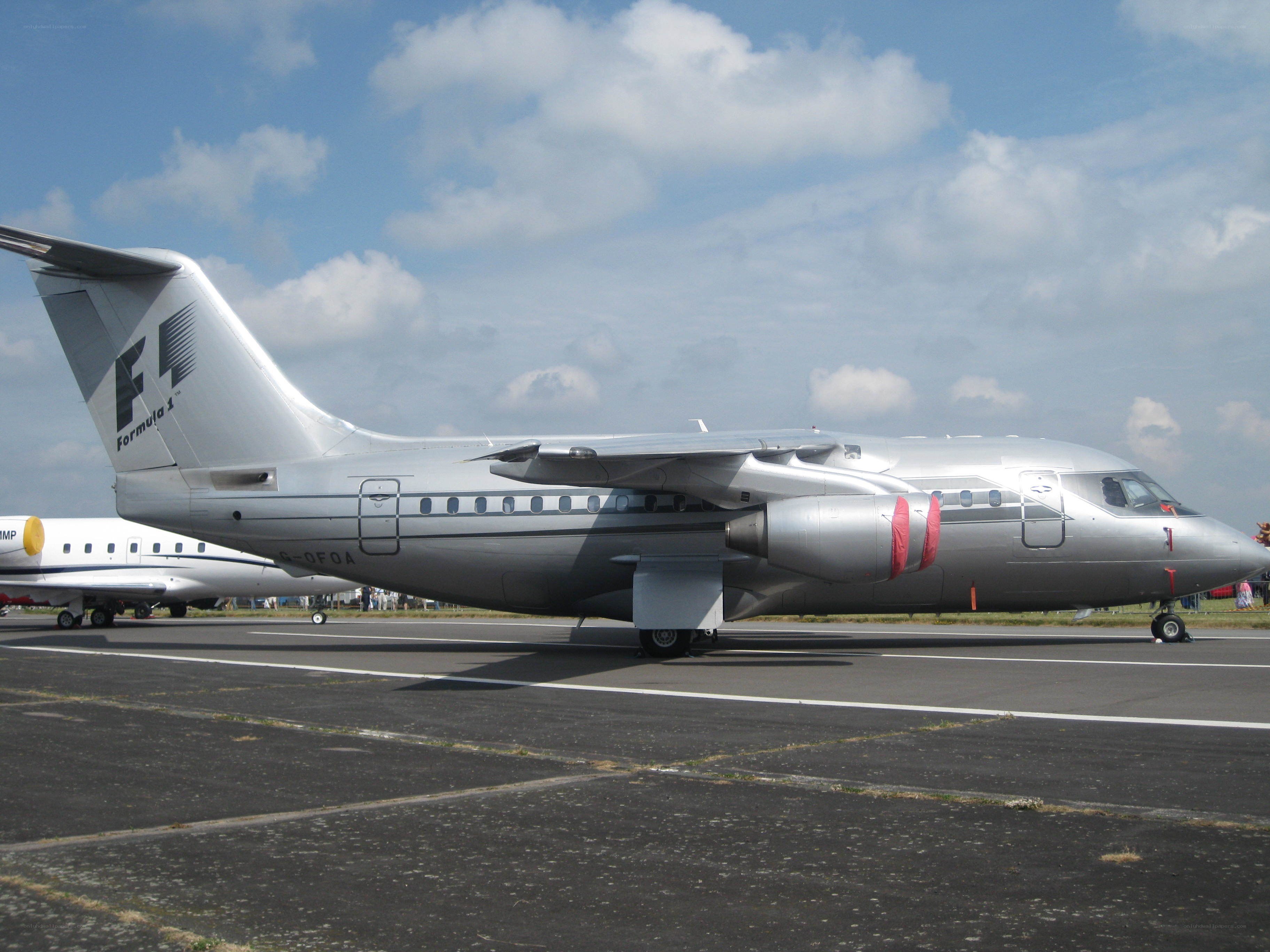 Silver jet on tarmac