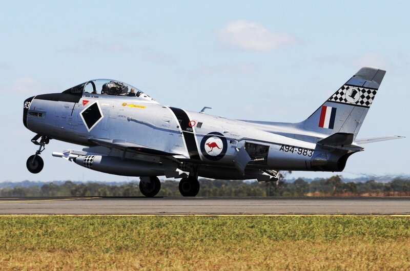 Silver Jet Taking Off
