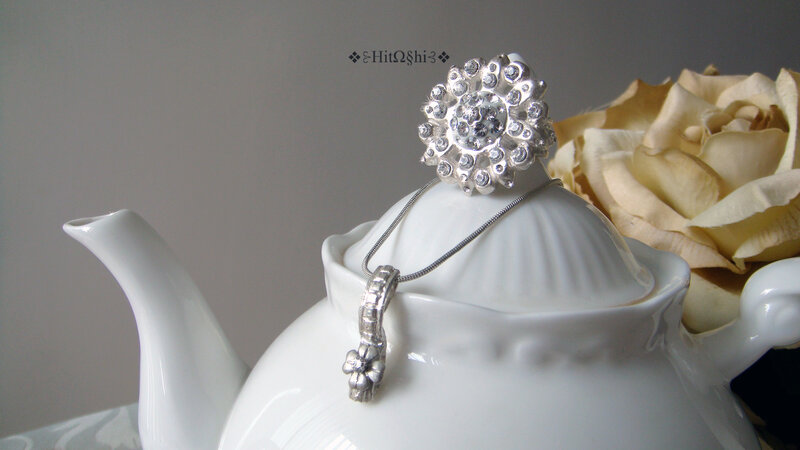 Silver Jewelry on Teapot