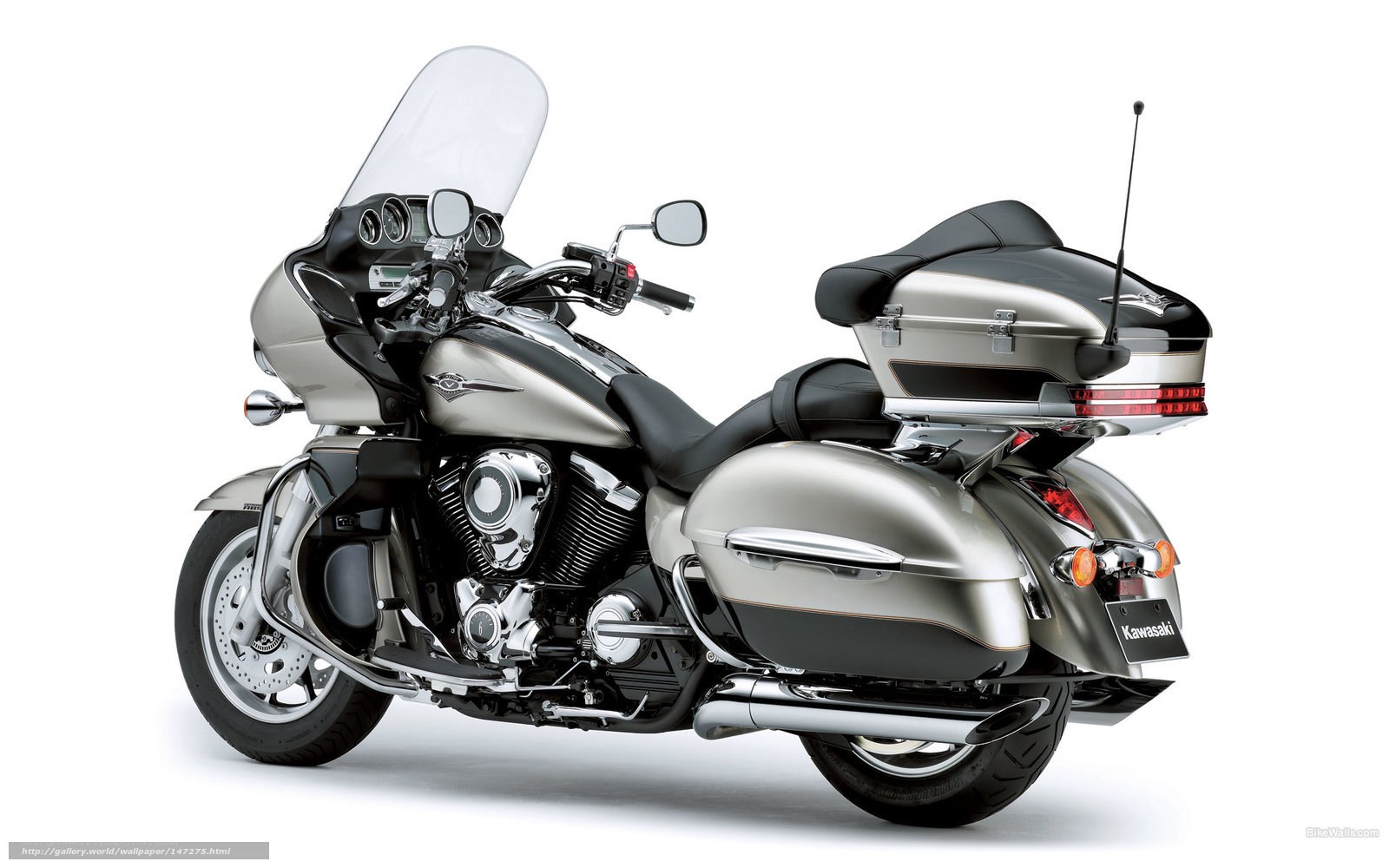 silver kawasaki touring motorcycle