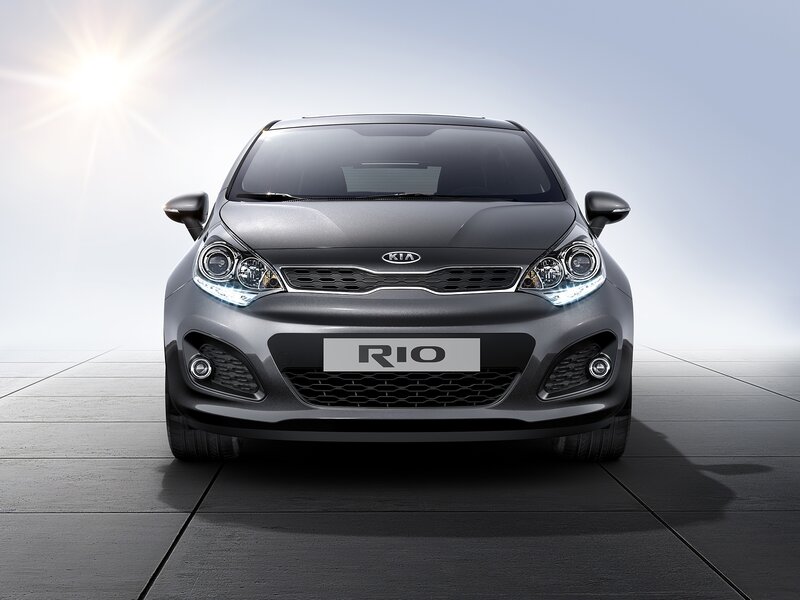 Silver Kia Rio Car