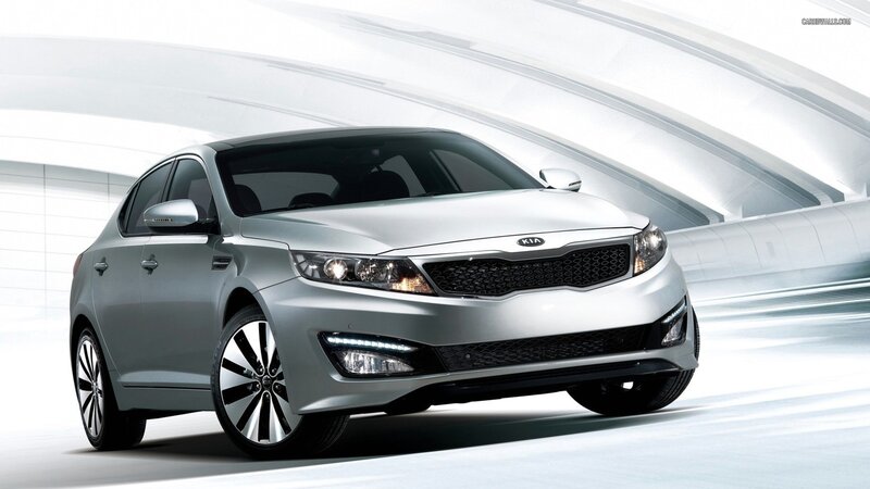 silver kia sedan car