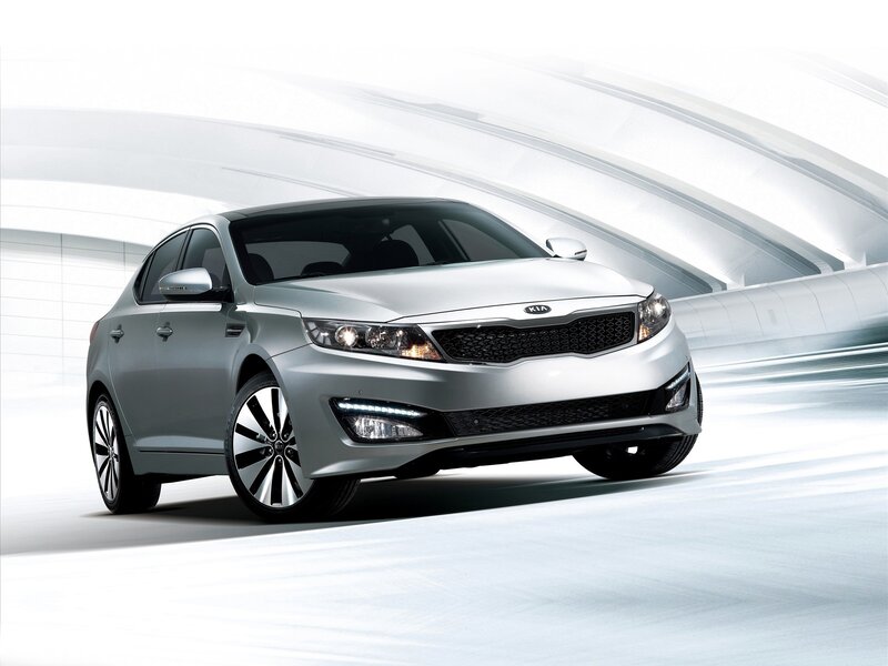 Silver Kia Sedan — Modern