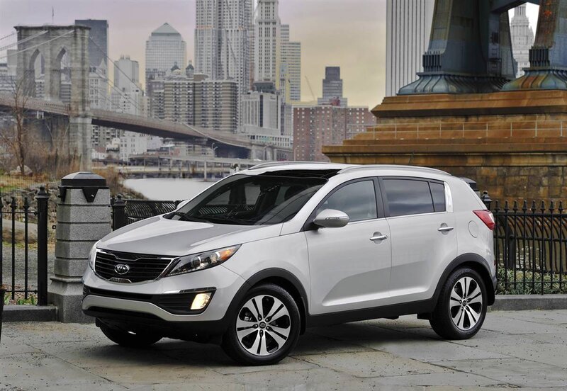 Silver Kia Sportage in city