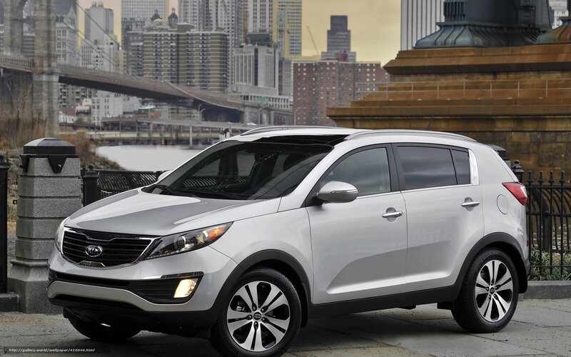 Silver Kia Sportage in city