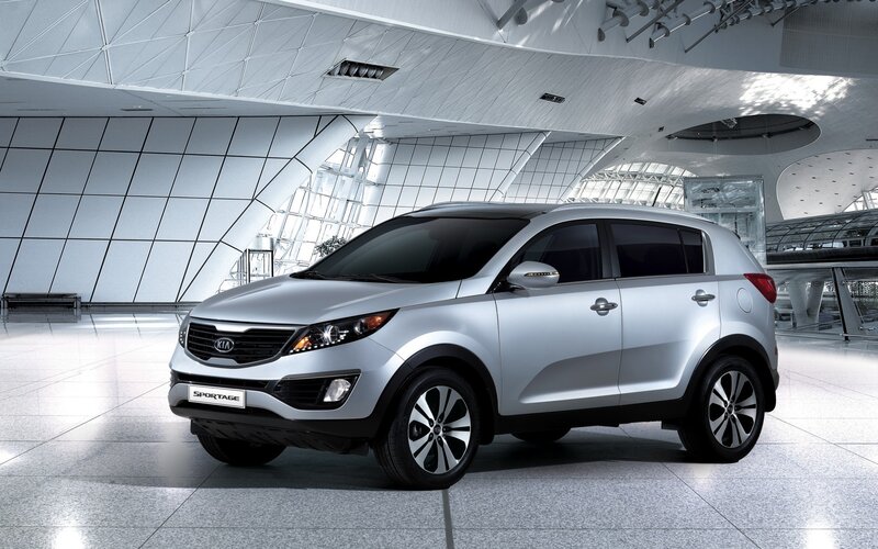 Silver Kia Sportage in modern hall