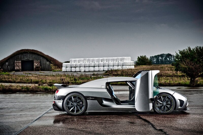 Silver Koenigsegg Agera on wet pavement