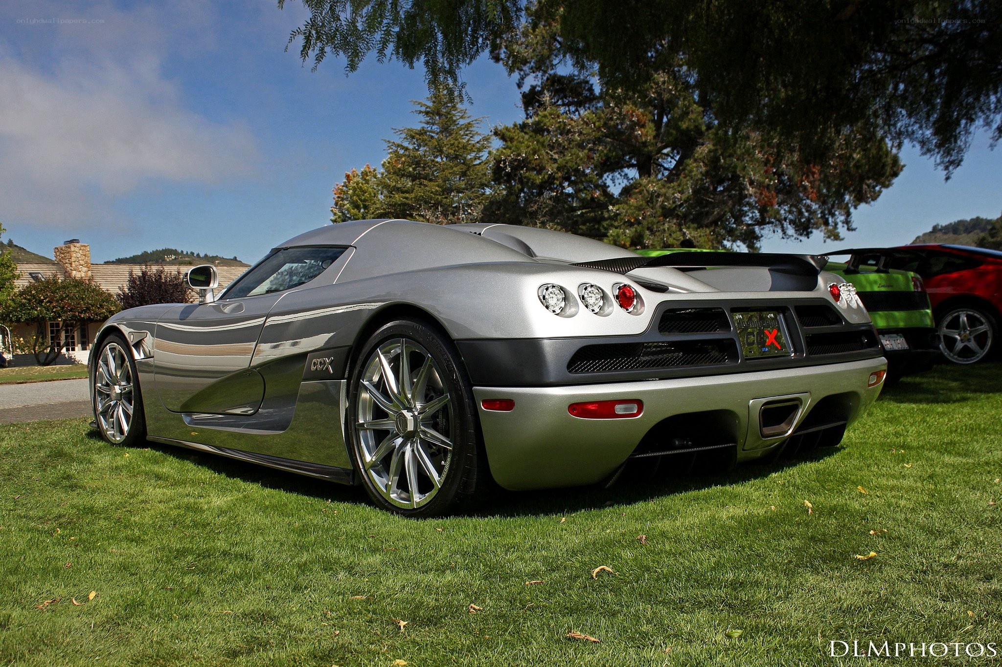 silver koenigsegg ccx on lawn