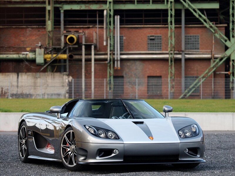 Silver Koenigsegg CCXR in industrial setting