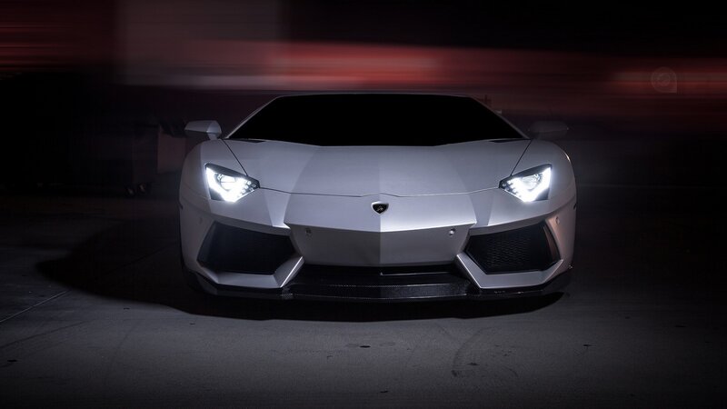 silver lamborghini at night