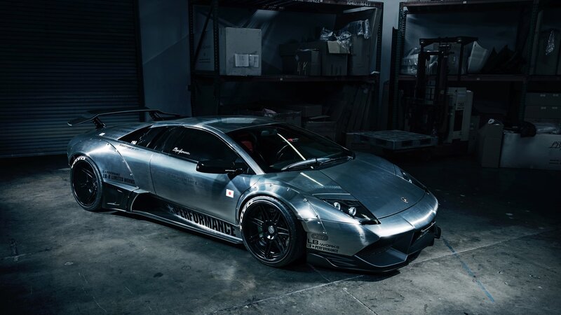 Silver Lamborghini in a warehouse