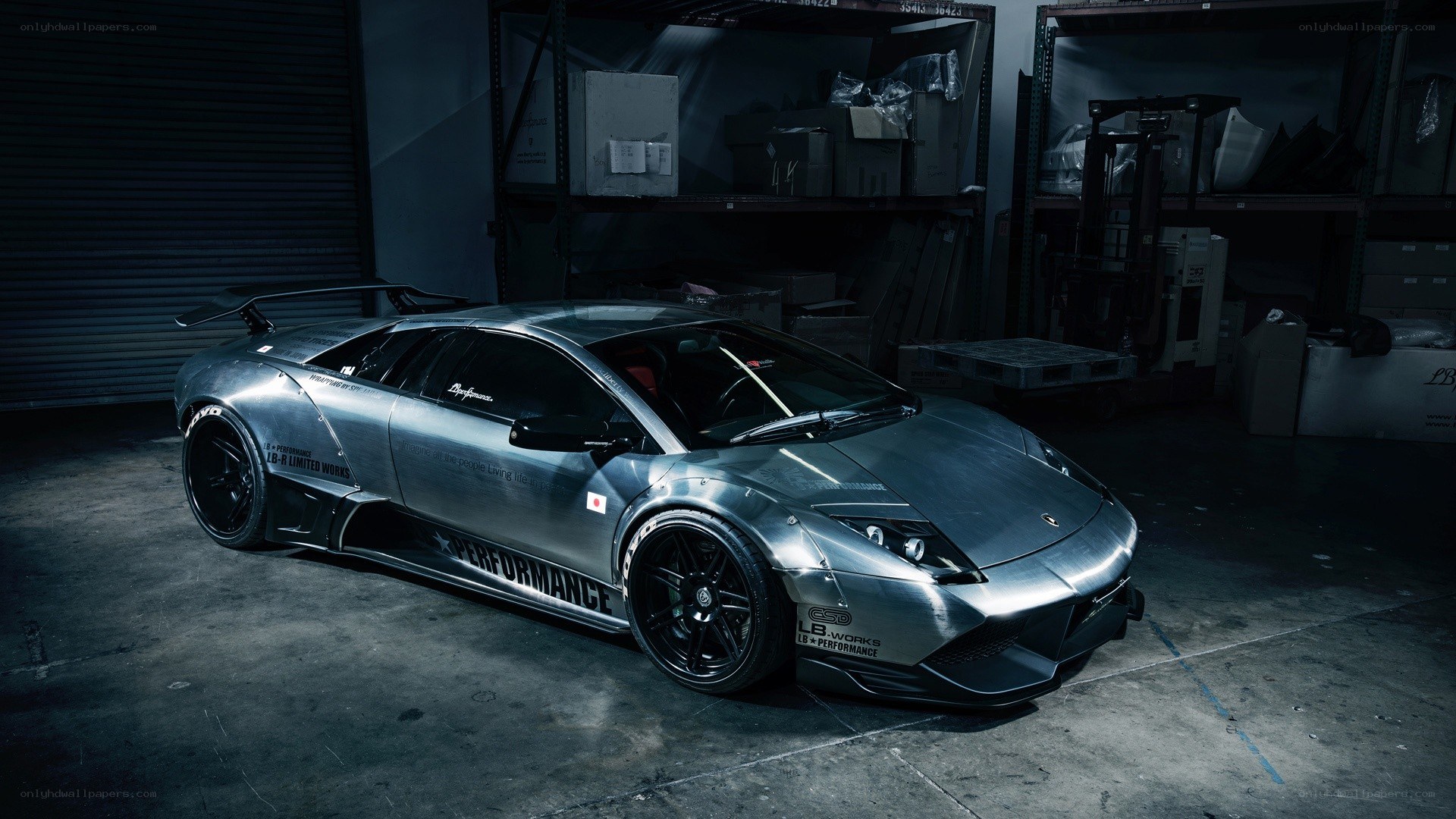 Silver Lamborghini in a warehouse
