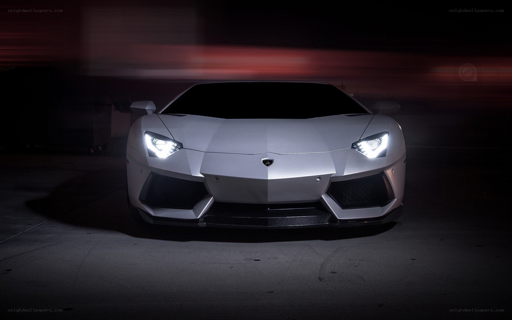 silver lamborghini in dark setting