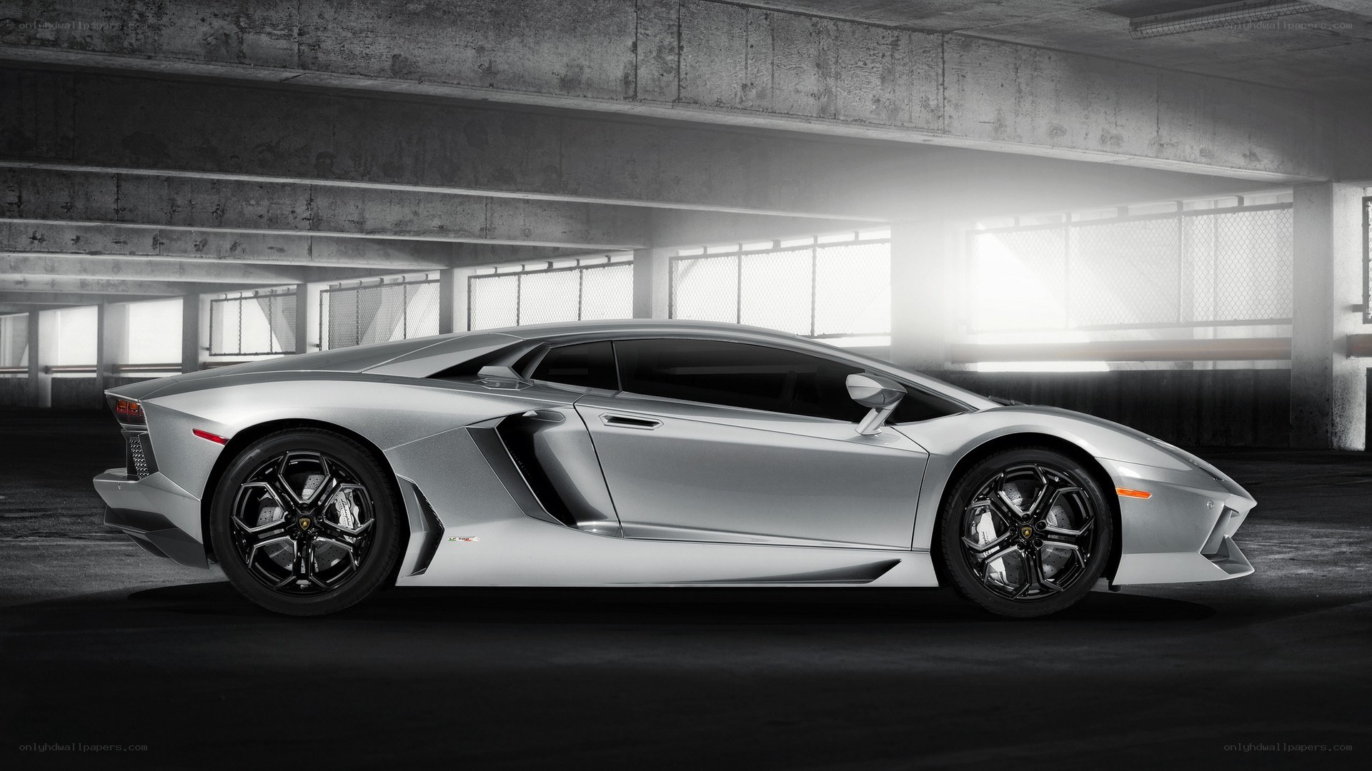 Silver Lamborghini in garage