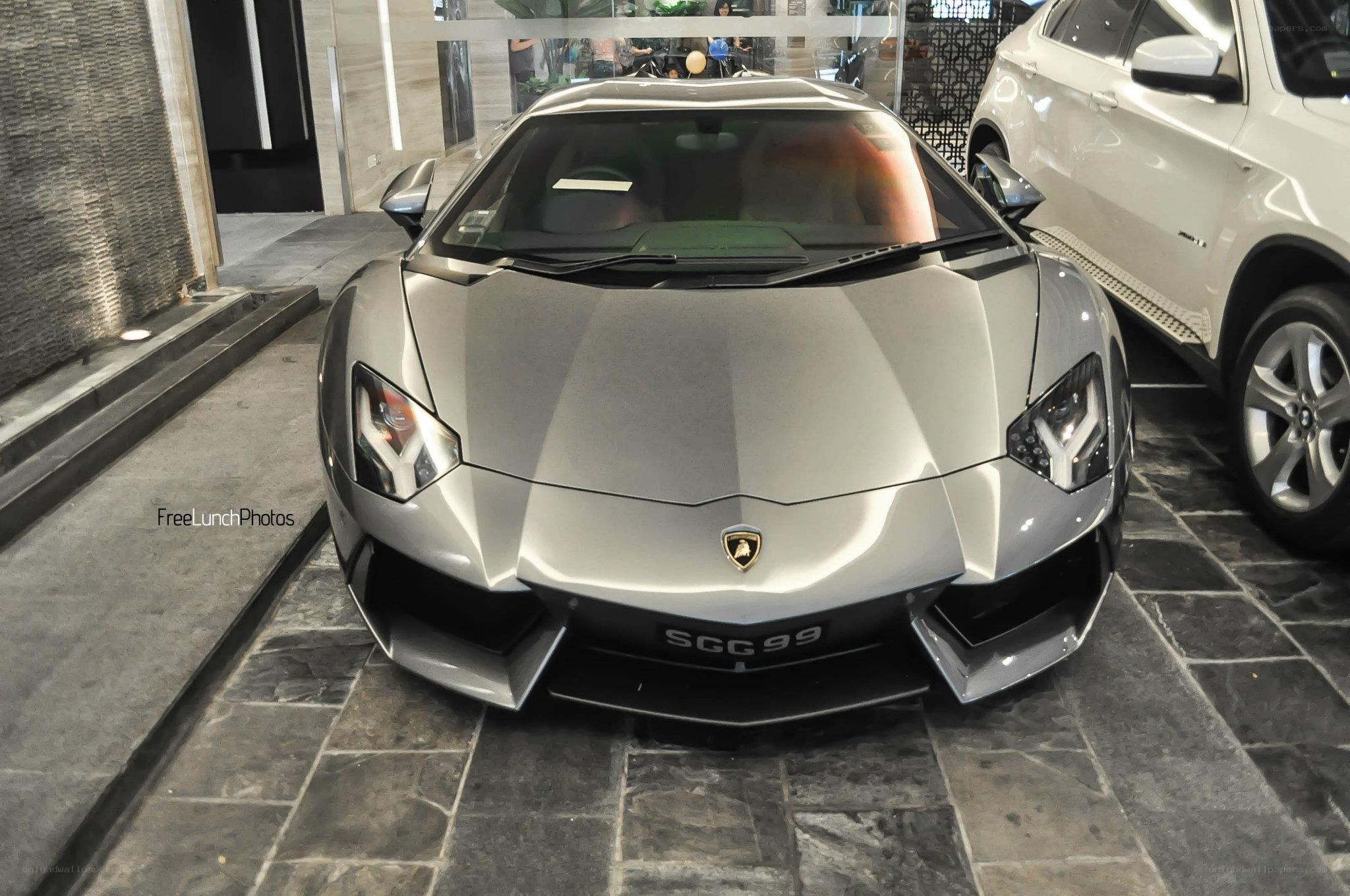 Silver Lamborghini in parking