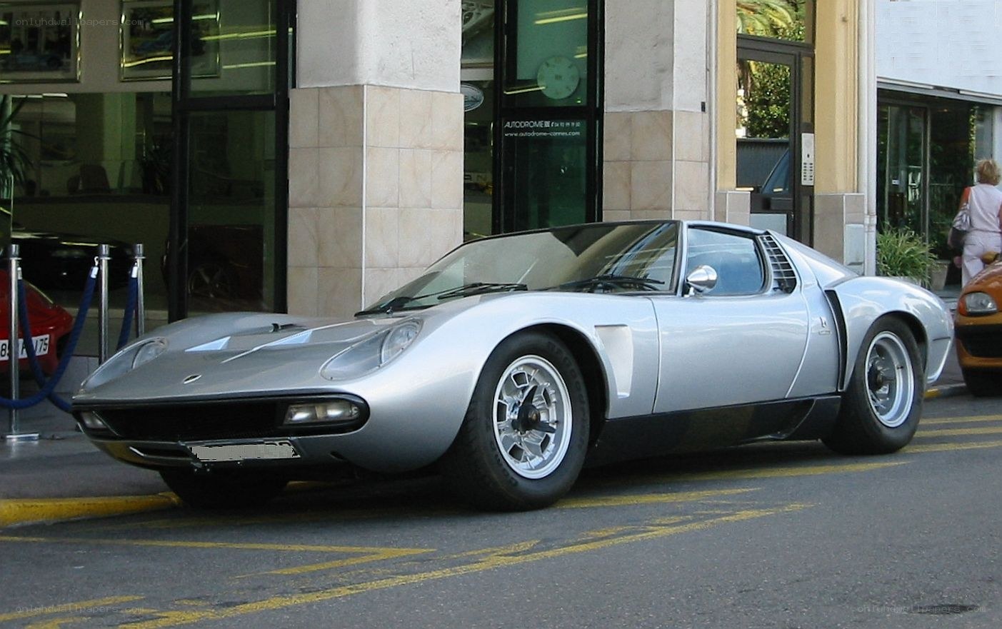 Silver Lamborghini Miura parked