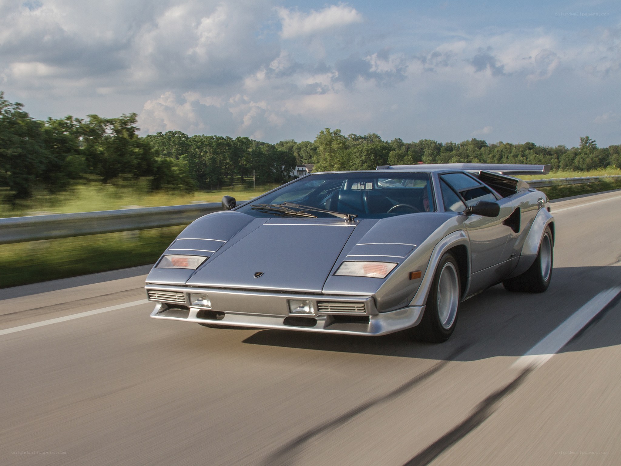 silver lamborghini on highway