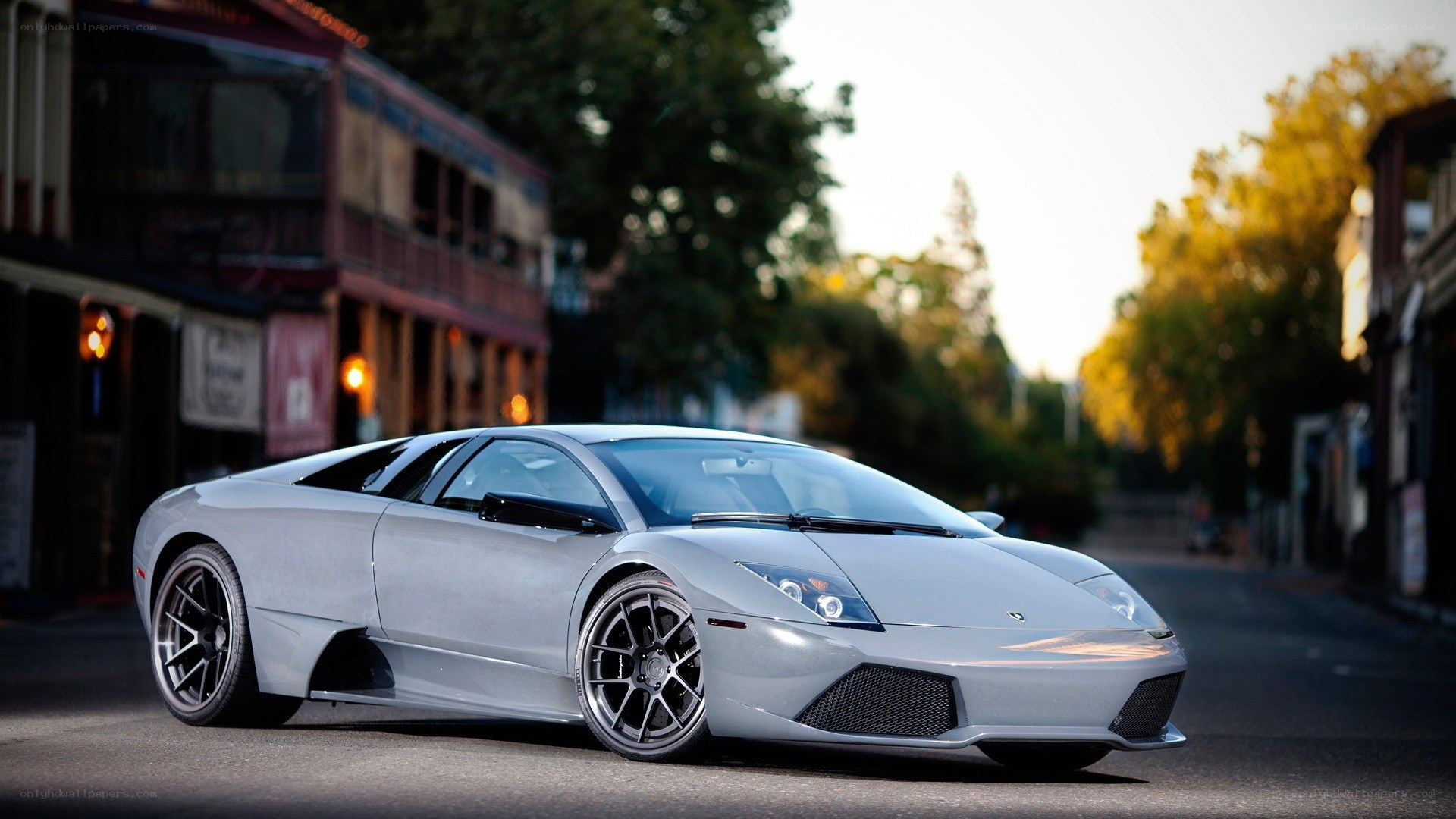silver lamborghini on street