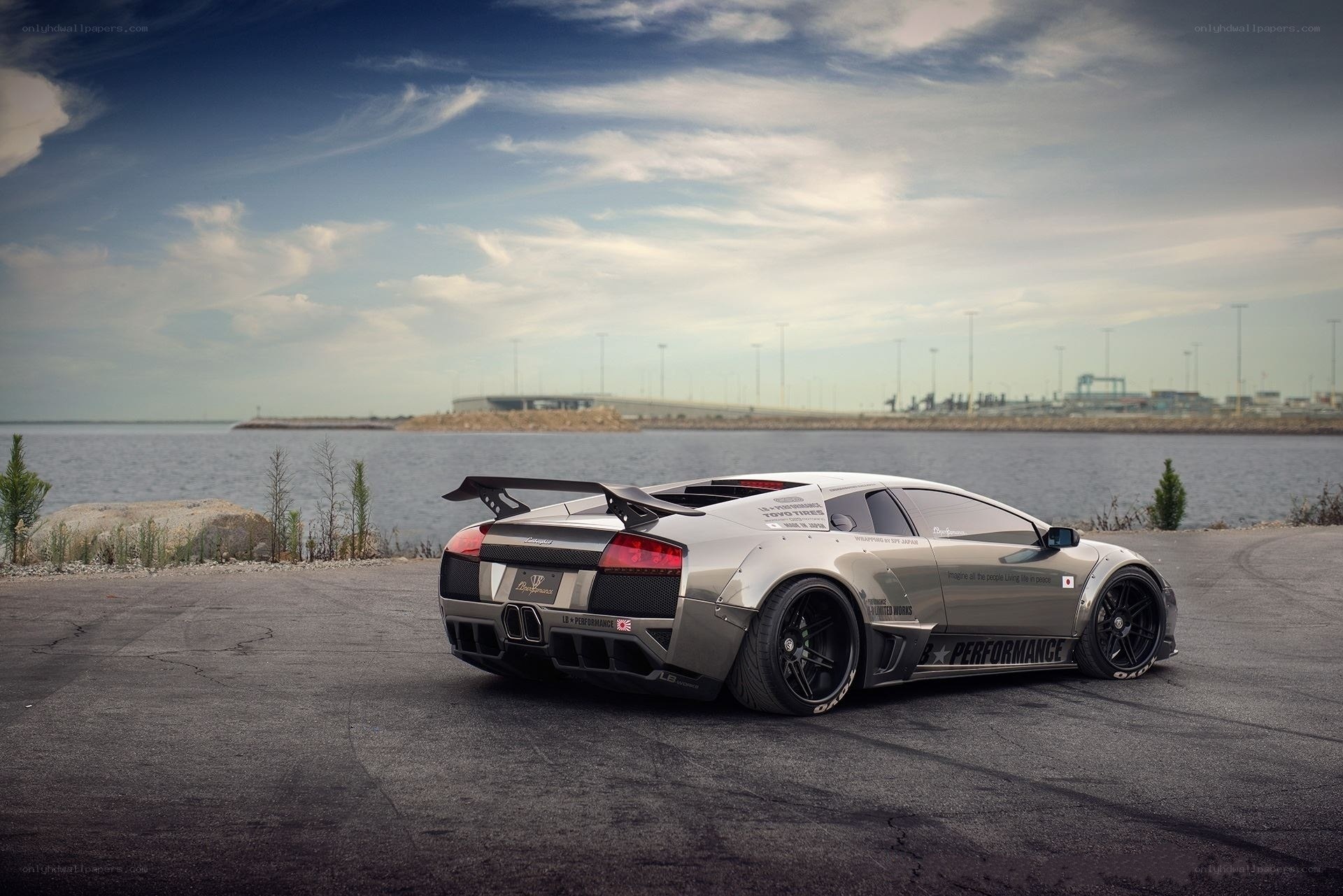 silver lamborghini on waterfront