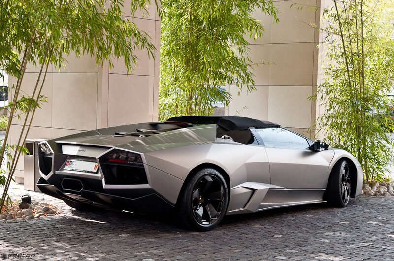 Silver Lamborghini parked outside