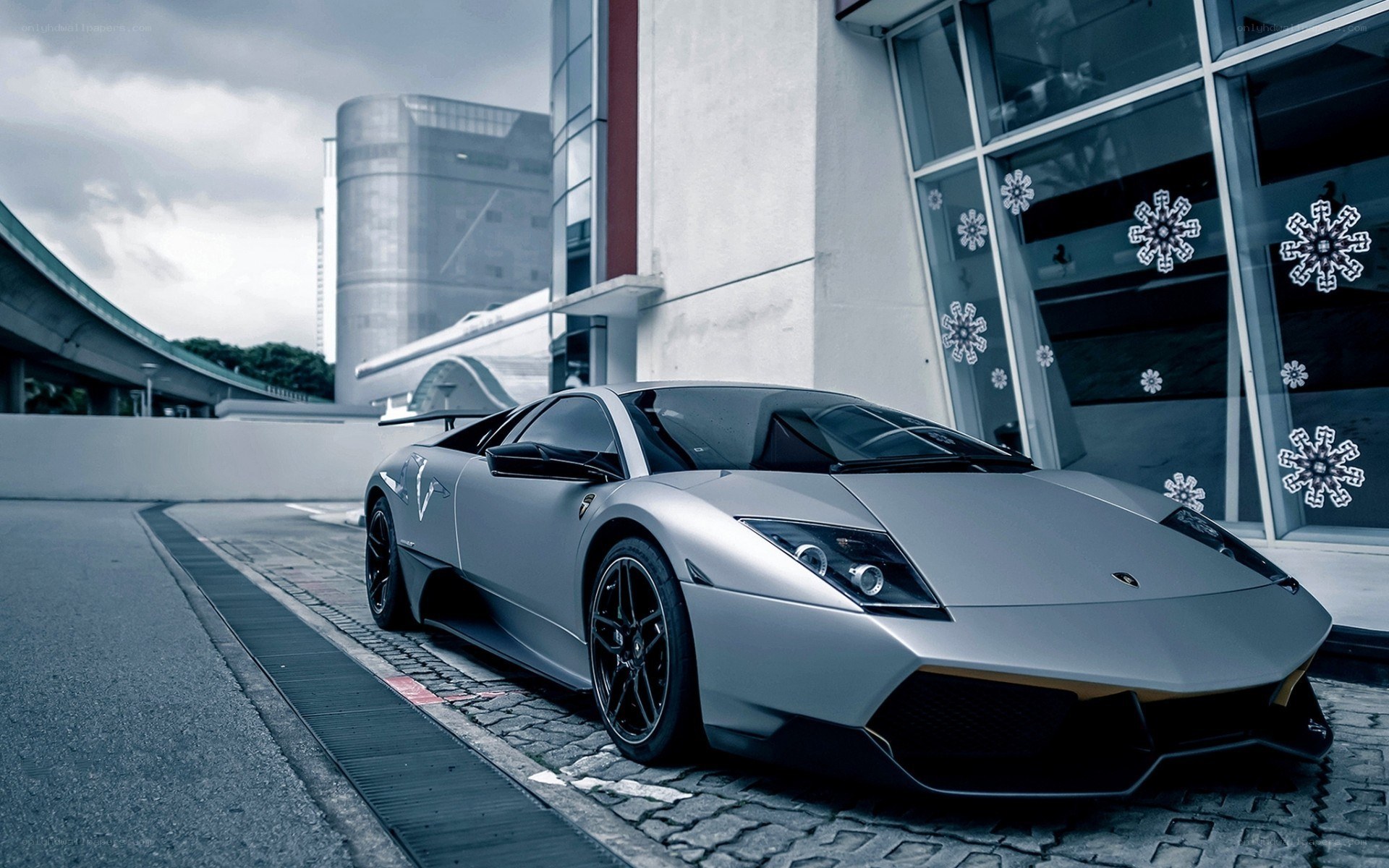 silver lamborghini parked outside