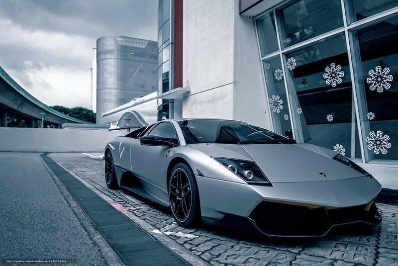 Silver Lamborghini parked outside