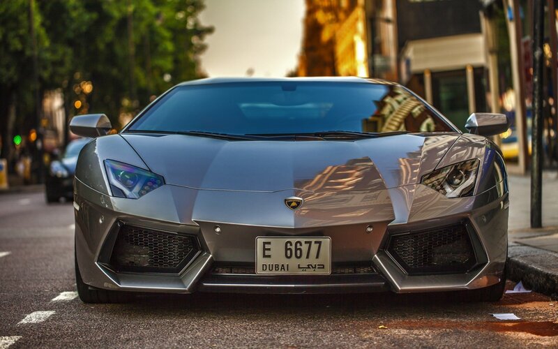 Silver Lamborghini Sports Car — Gray, Dramatic, Sunset
