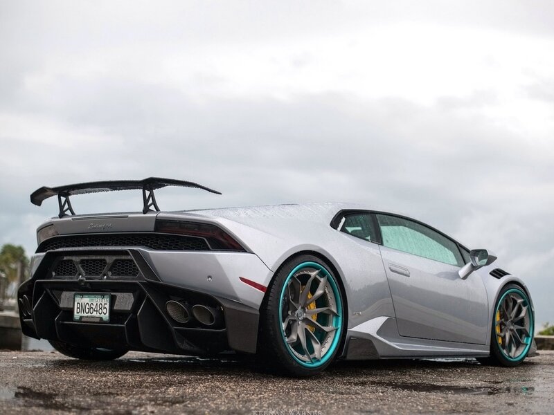 silver lamborghini with custom wheels