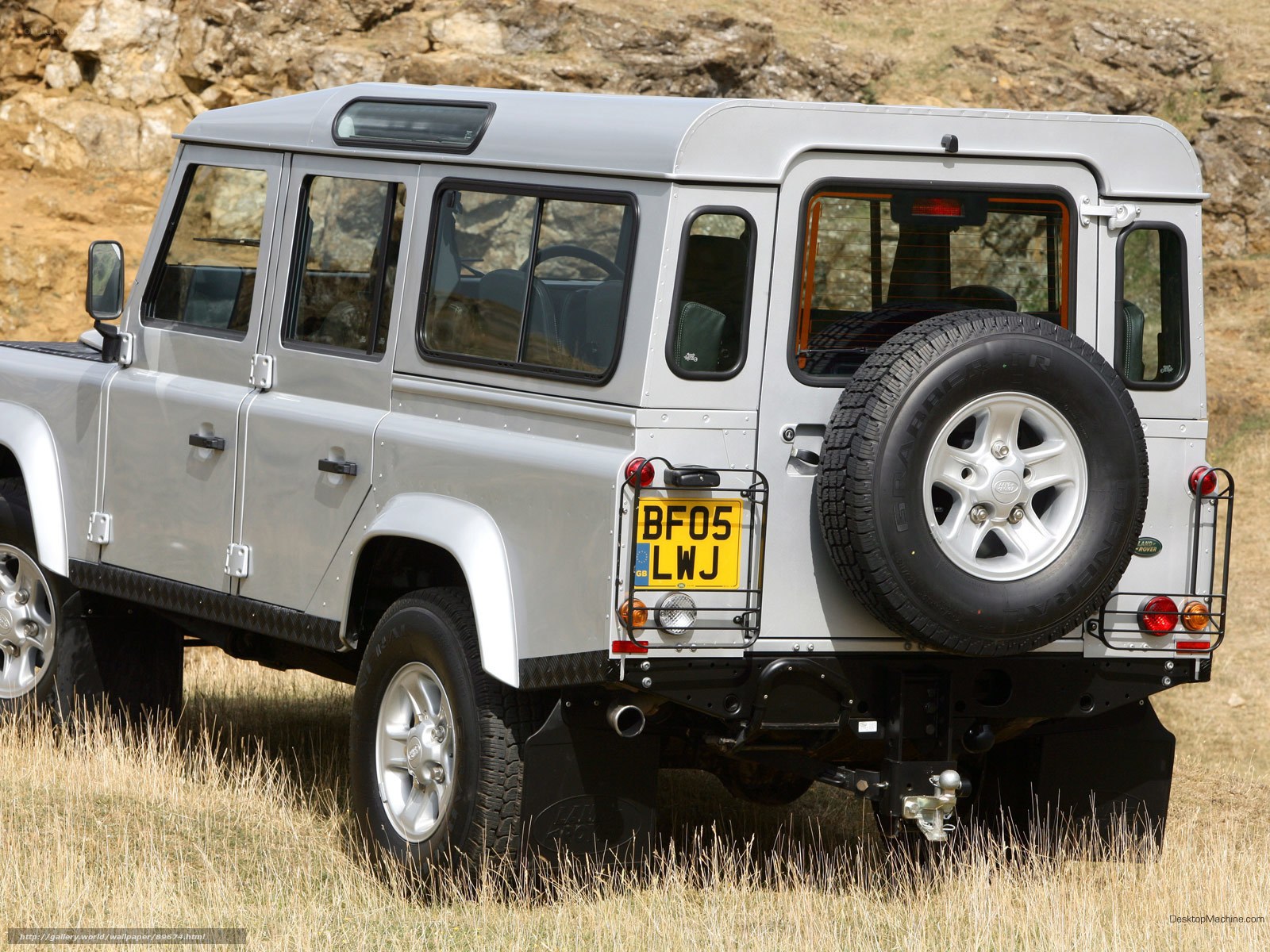 silver land rover defender