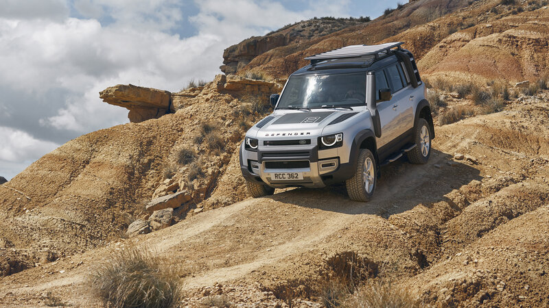 Silver Land Rover Defender — Brown