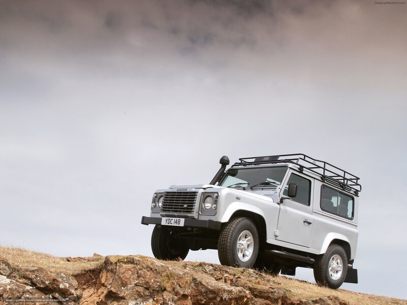 Silver Land Rover Defender — White