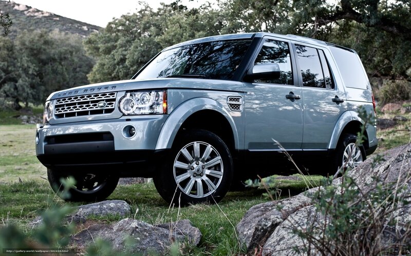 Silver Land Rover in a natural setting