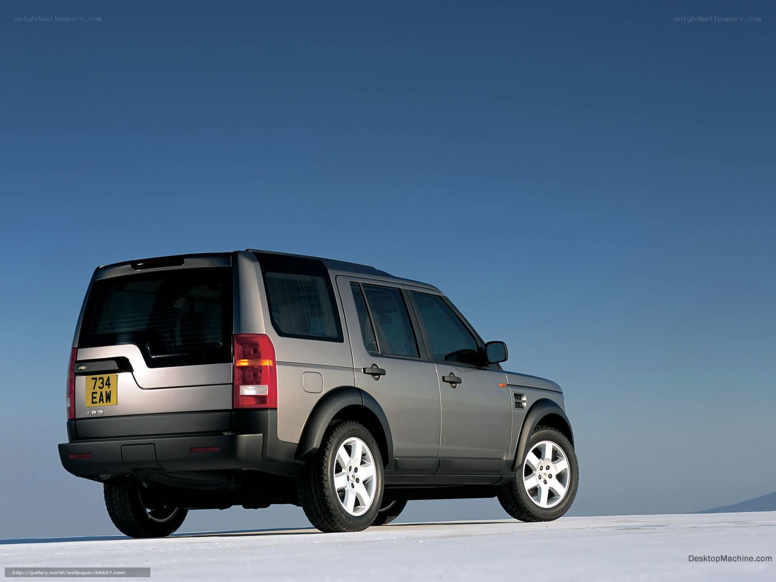 silver land rover in snow