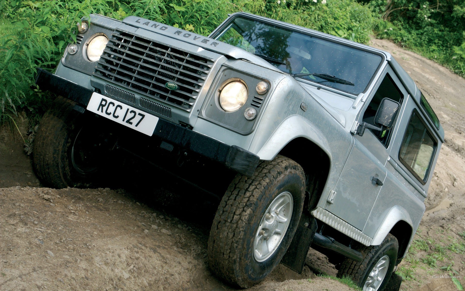 Silver Land Rover off-roading