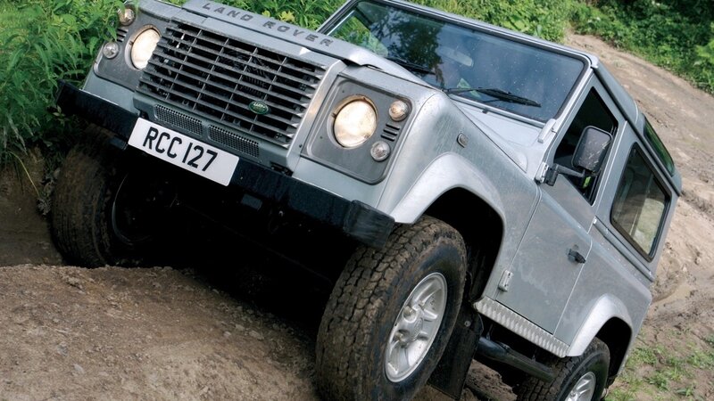 Silver Land Rover off-roading