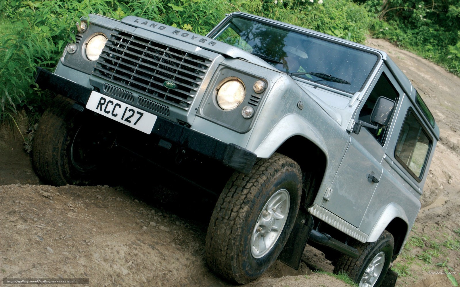 Silver Land Rover off-roading