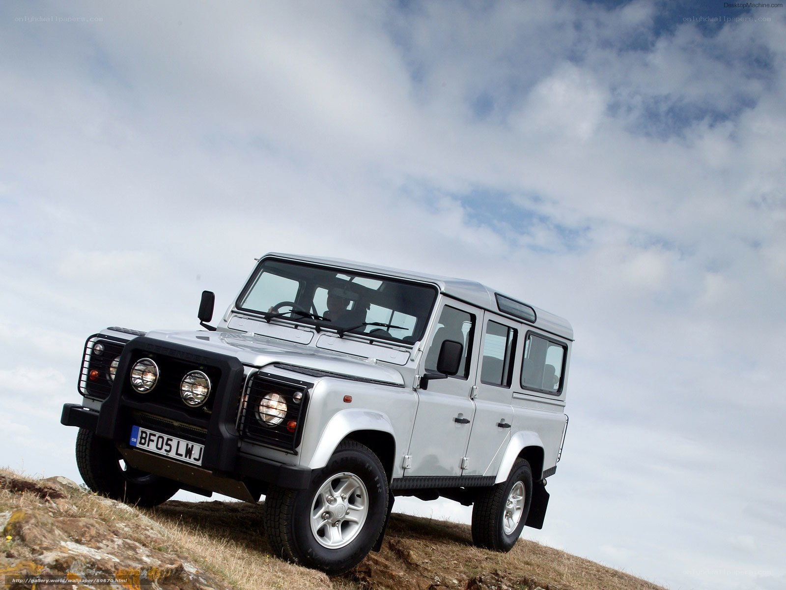 silver land rover on hillside