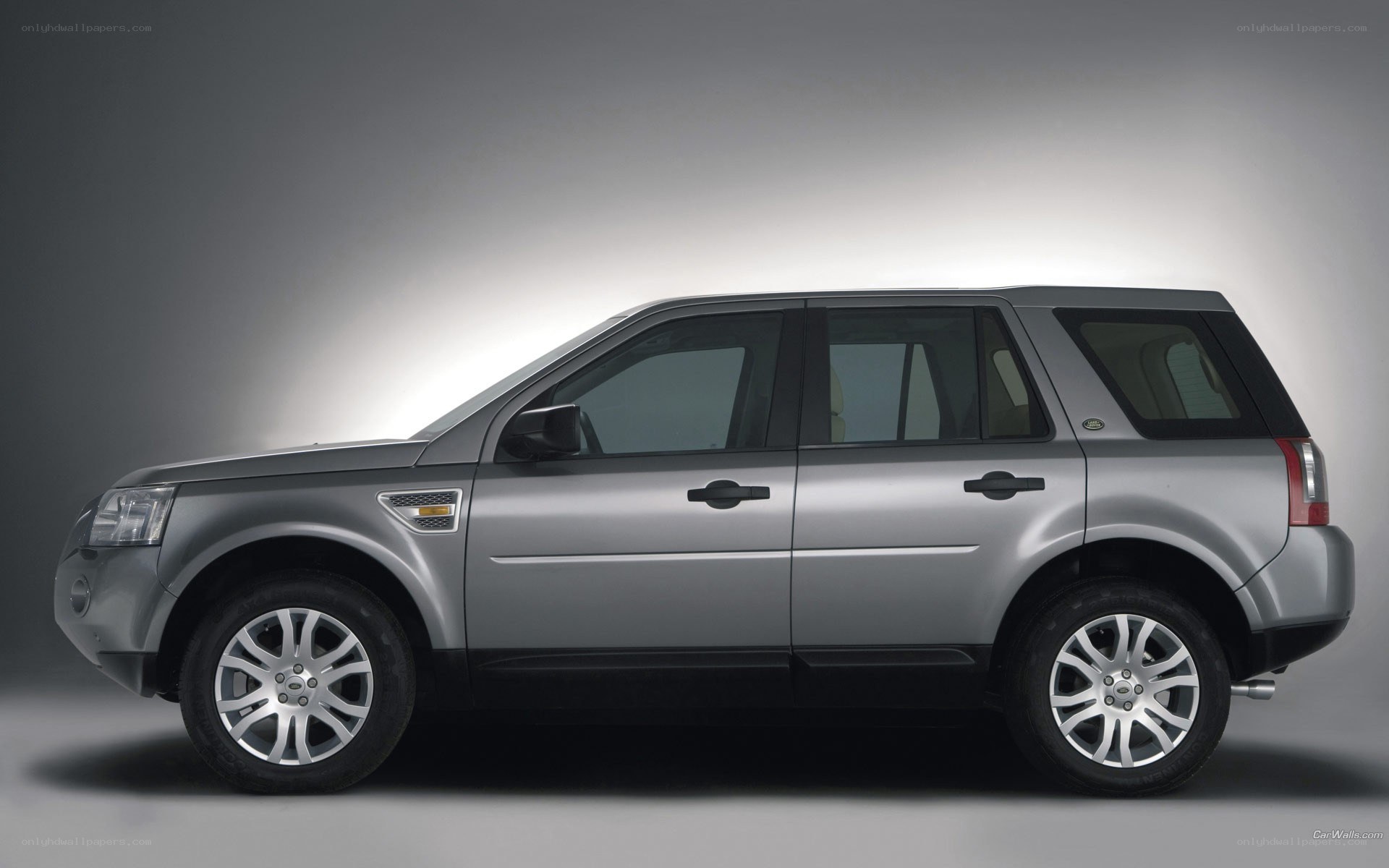 silver land rover suv
