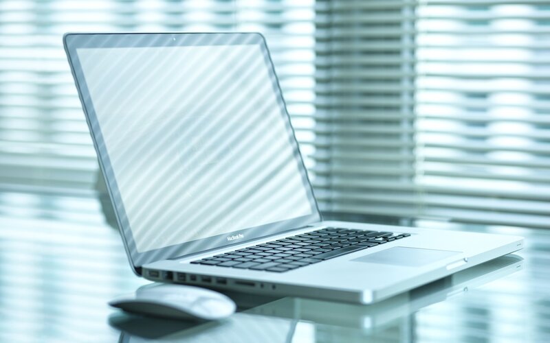 Silver Laptop on Desk — White