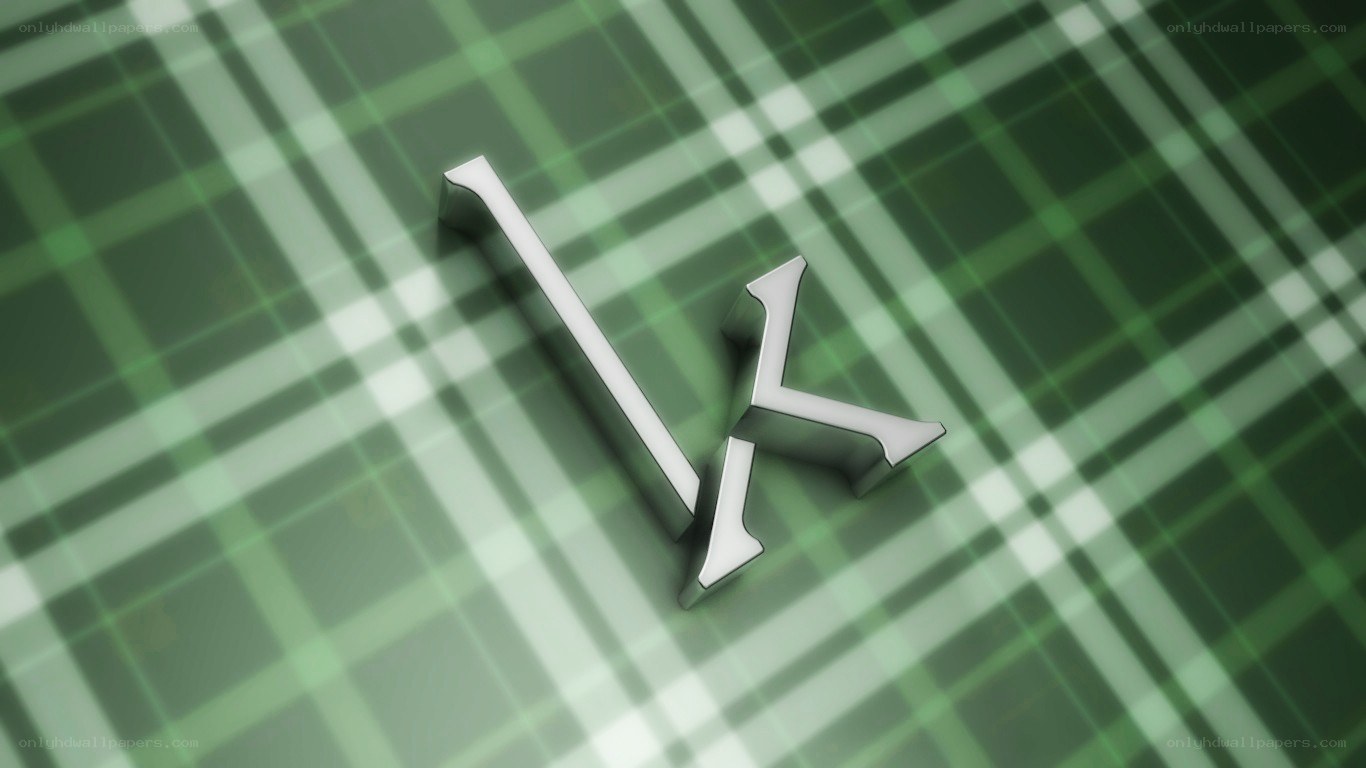 silver letter K on plaid