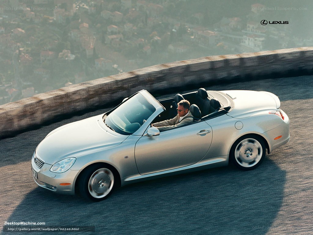 Silver Lexus convertible on road