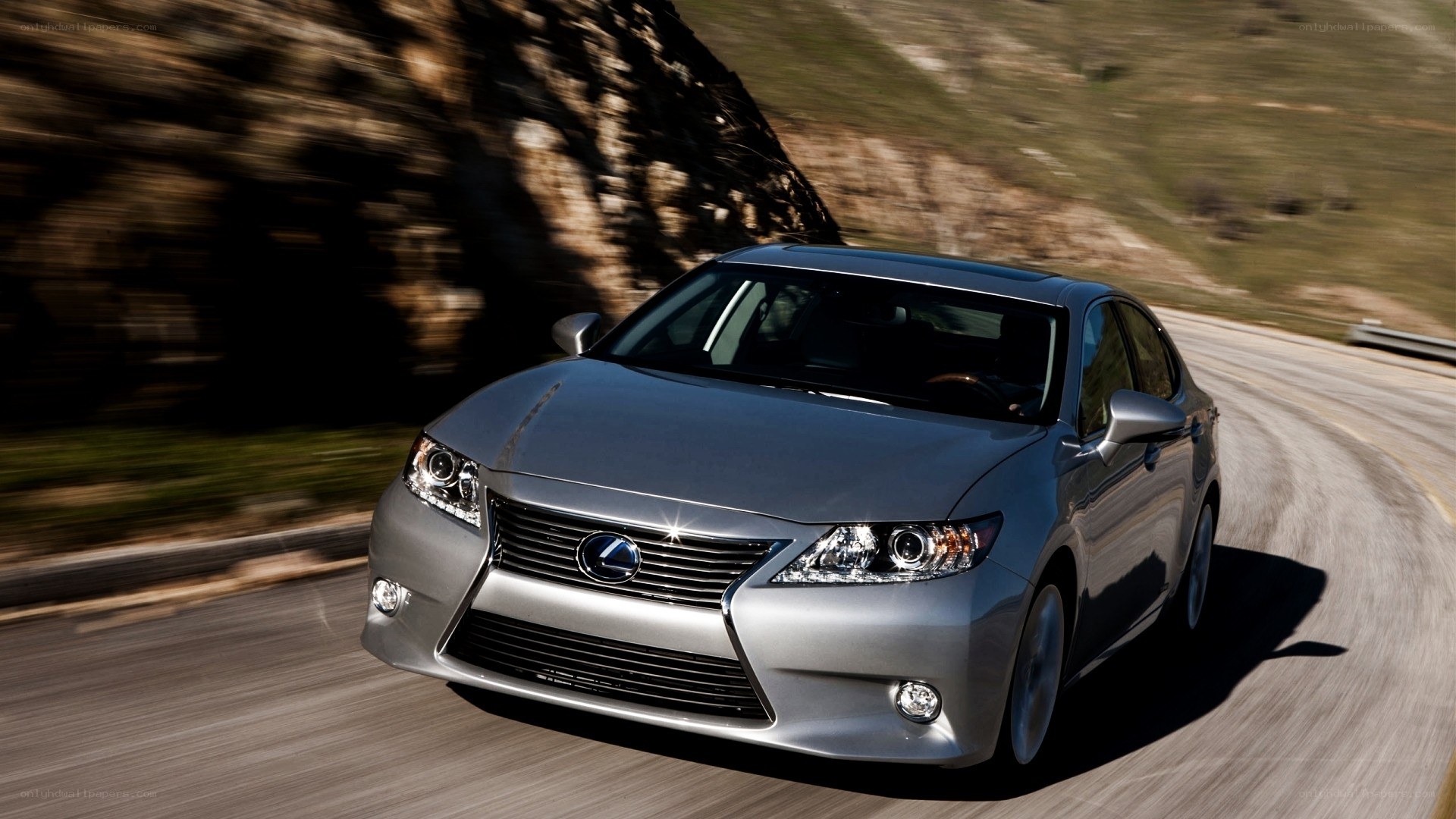 silver lexus driving on road
