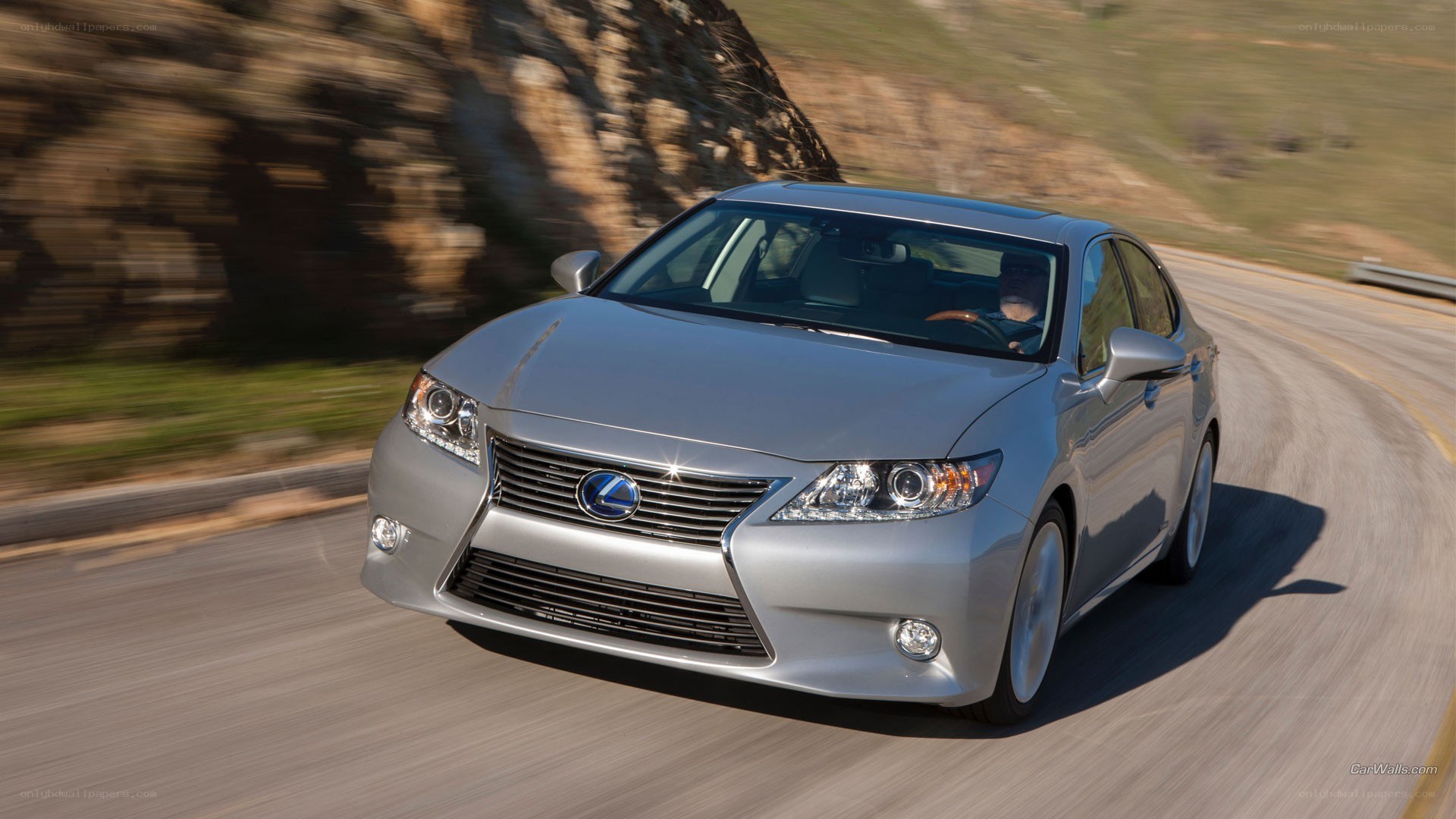silver lexus driving on road